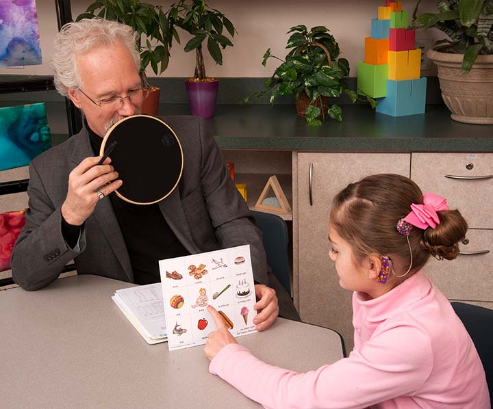 Functional auditory skills testing with child with cochlear implant
